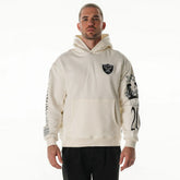 Las Vegas Raiders The Wild Collective Unisex Stacked Graphic Sleeve Fleece Hoodie - Cream - NFL