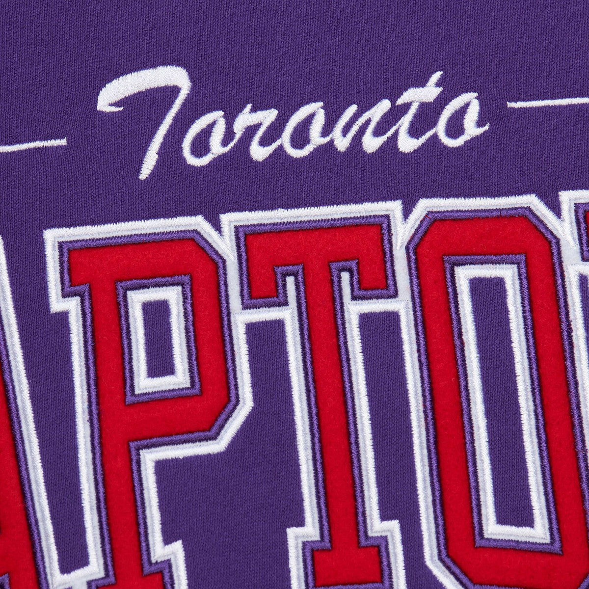 Mitchell & Ness Toronto Raptors Hardwood Classics There & Back 2.0 Vintage Pullover Sweatshirt Purple