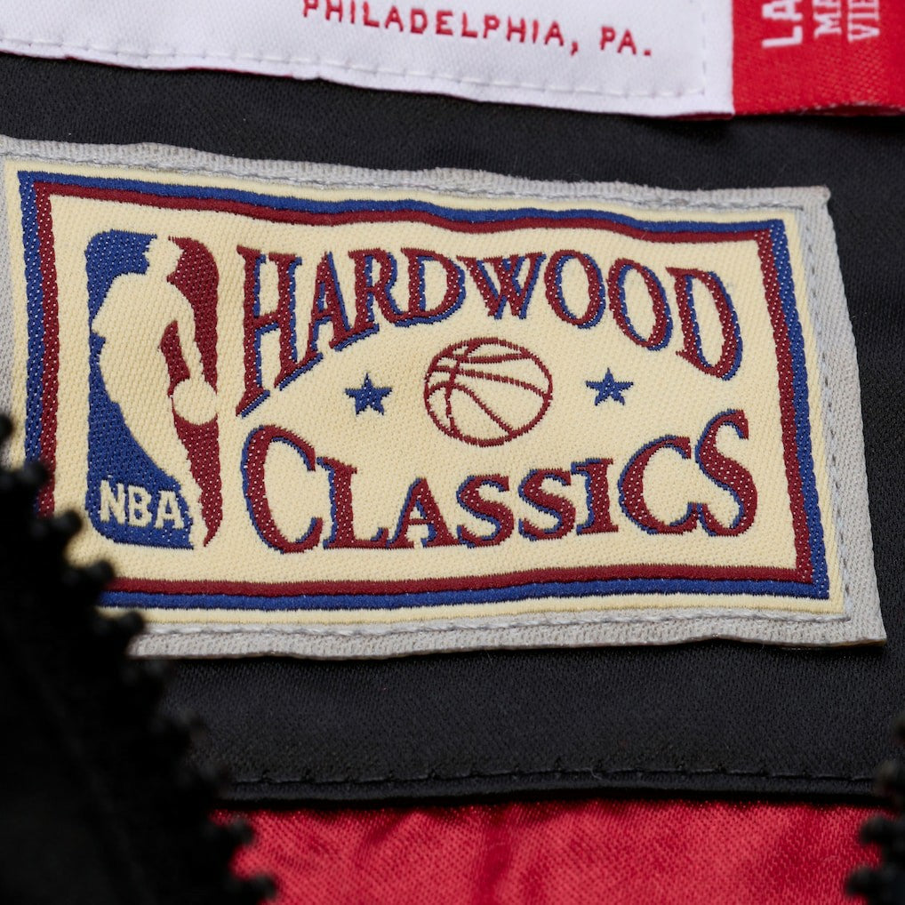 Mitchell & Ness Cleveland Cavaliers Hardwood Classics Nights Walk the Tunnel Satin Bomber Full-Snap Hooded Jacket Black