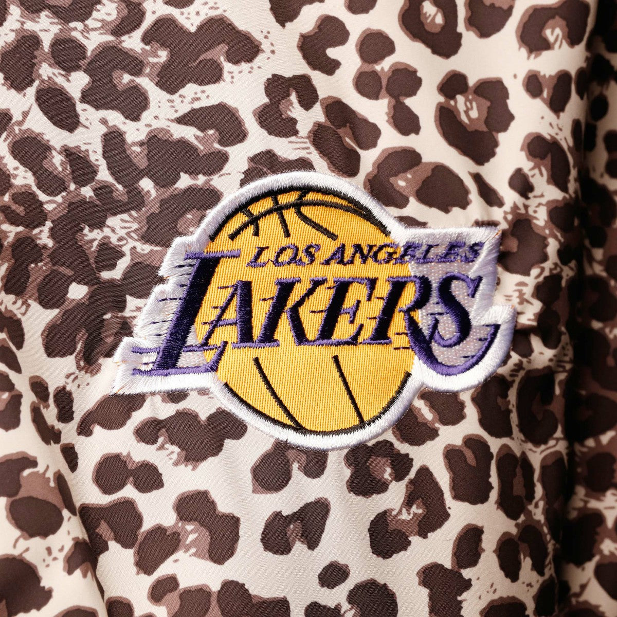 Los Angeles Lakers DKNY Sport Women's Gabriella Windbreaker Half-Zip Hoodie Leopard